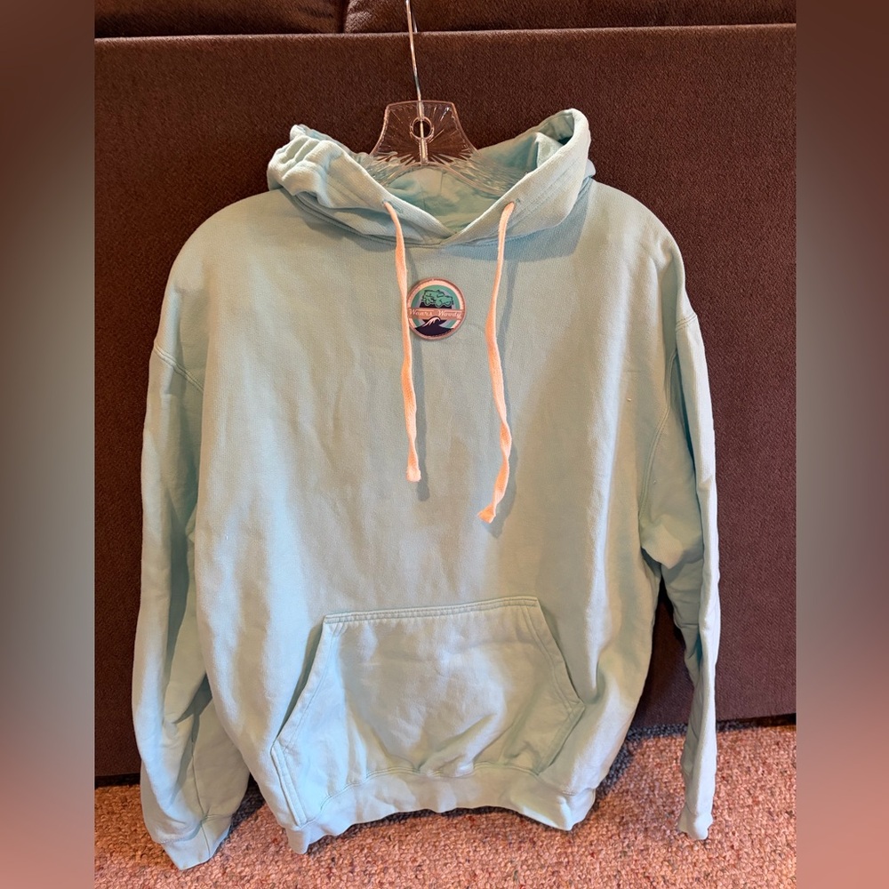 Wears Woody hoodie